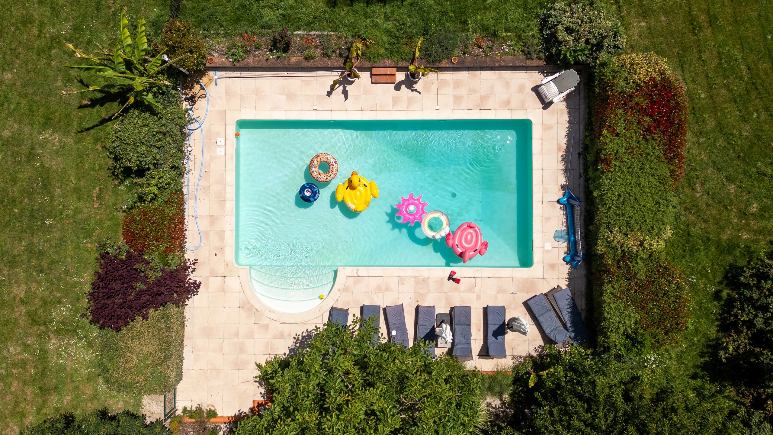 Pool resurfacing and tile renovation showing upgraded finish