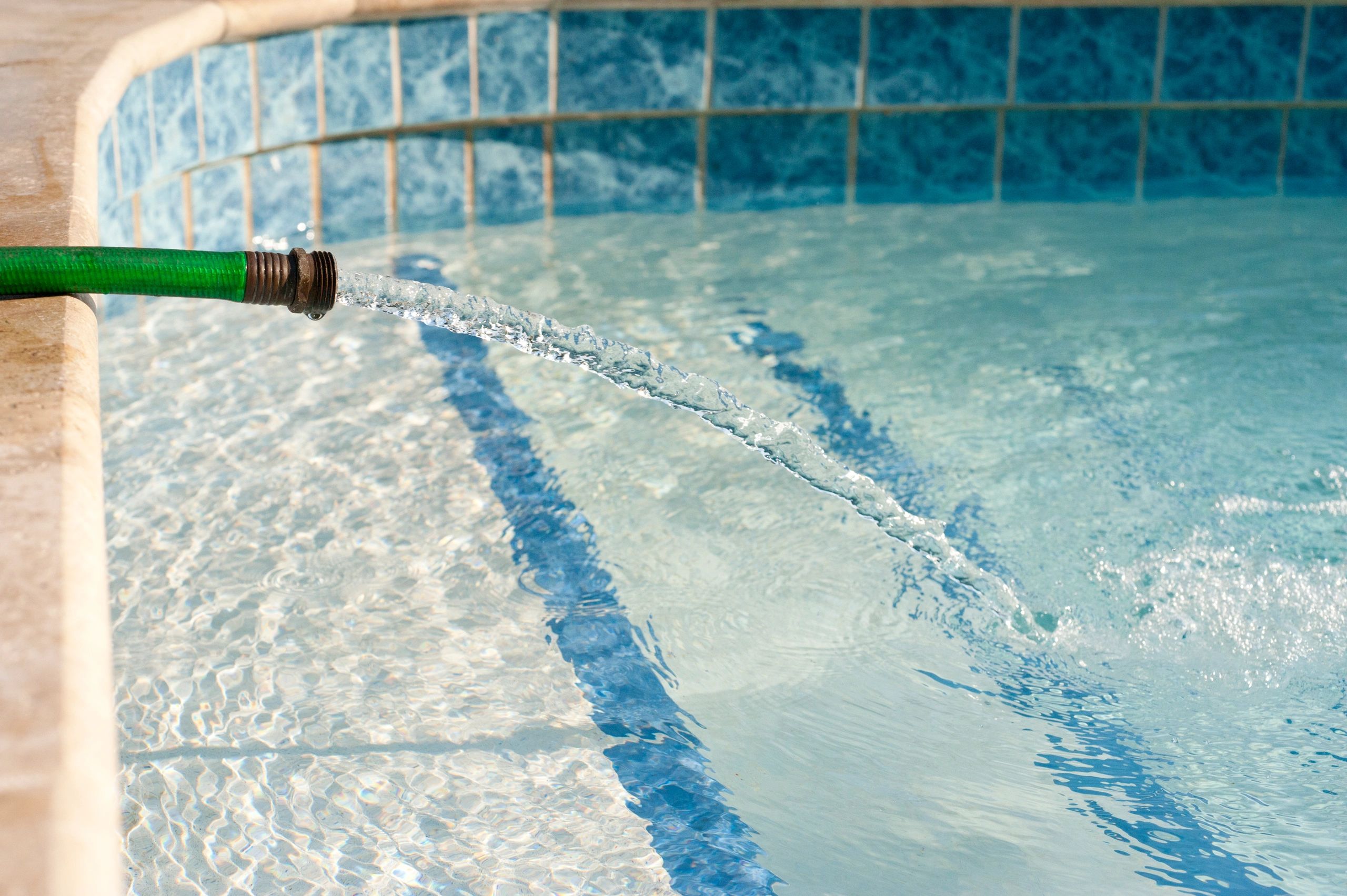 Pool water level and shell area during leak inspection